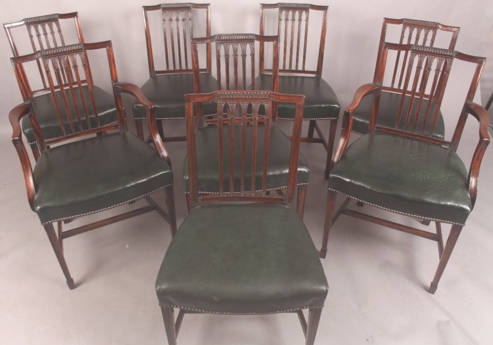 A Set of Eight Sheraton Style Dining Chairs