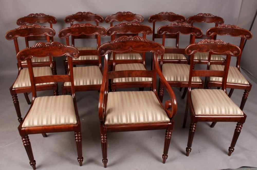 Fine and Rare Set of 12 Plus one Carver Georgian Dining Chairs
