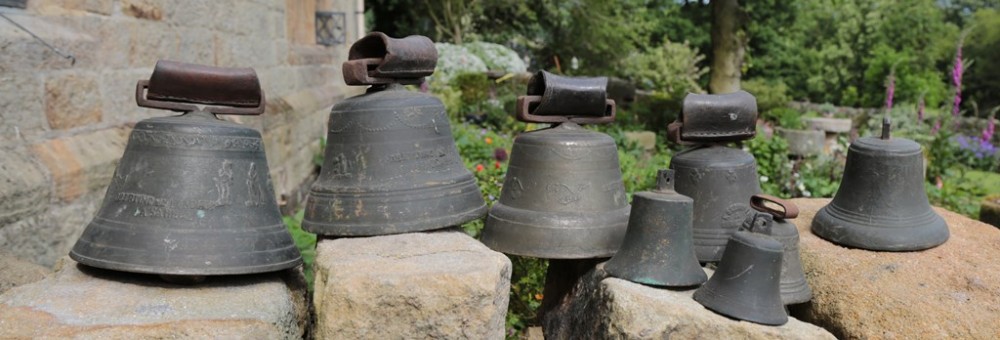 A set of eight 18th C cow bells 