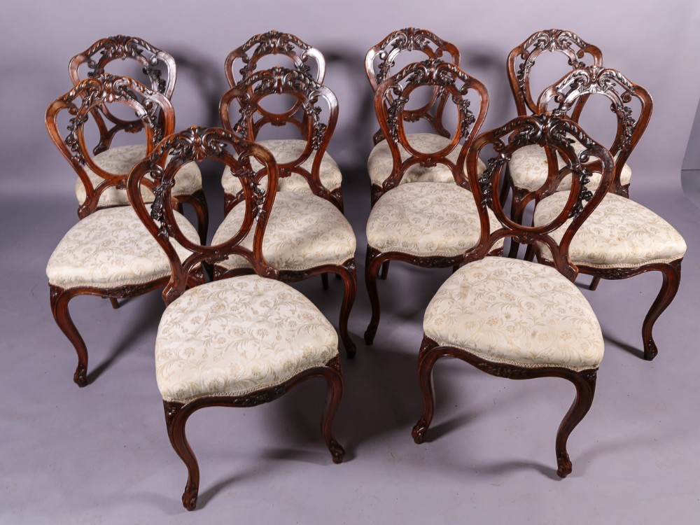 A Set of 10 Victorian Walnut Dining Chairs