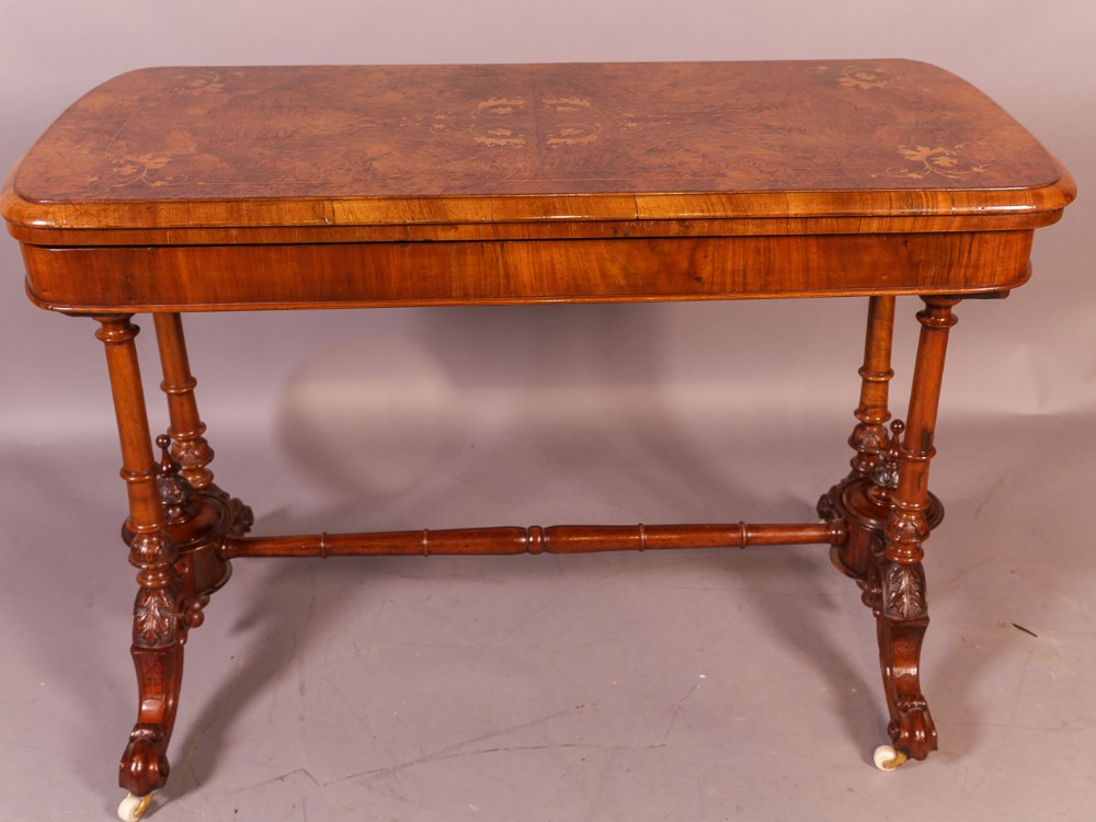 A Superb Victorian Games Table in Burr Walnut with inlay of Box Wood,
DIMENSIONS
WIDTH 108CMS
DEPTH 53 CMS
HEIGHT 74 CMS