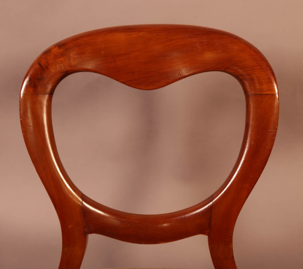 A Set of 10 Victorian Mahogany Balloon Back dining Chairs View IX