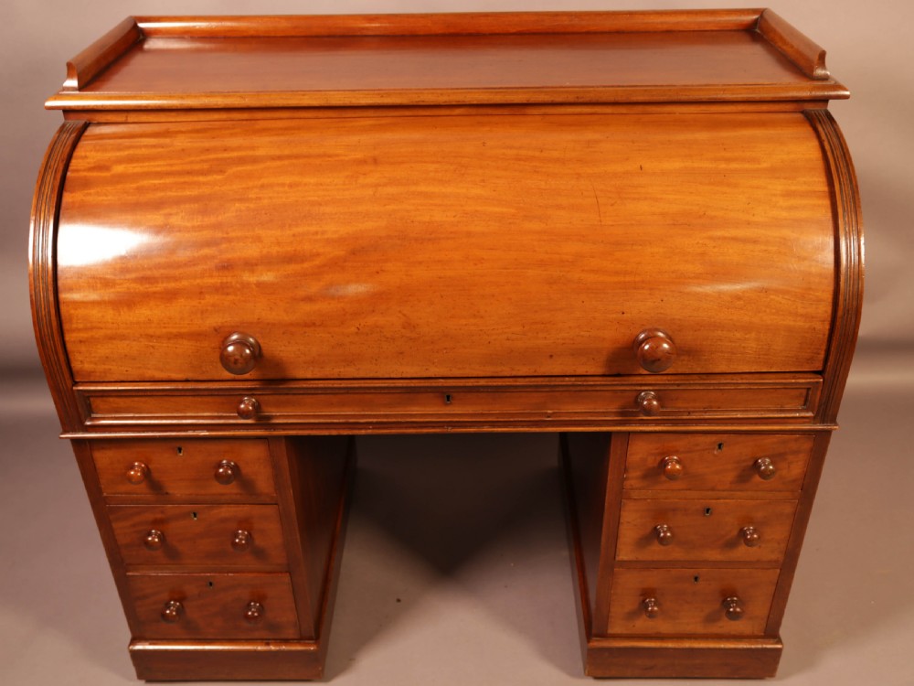 A Victorian Cylinder desk in Mahogany
