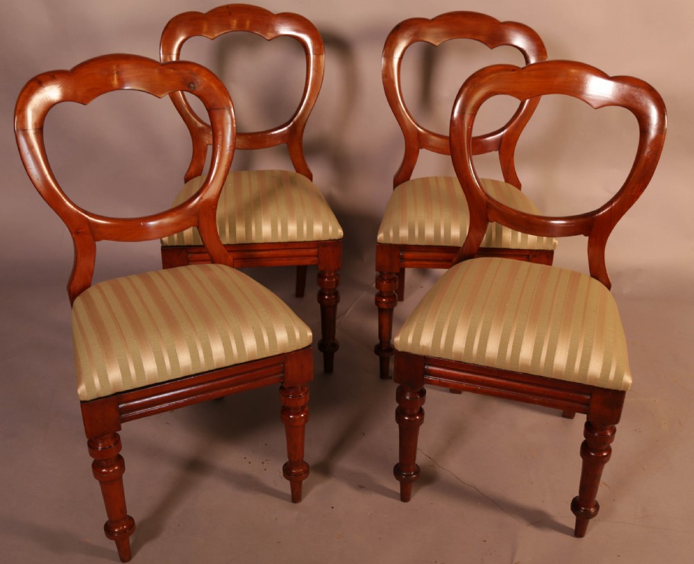 A Good Set of 12 Victorian Mahogany Balloon Back dining Chairs View III