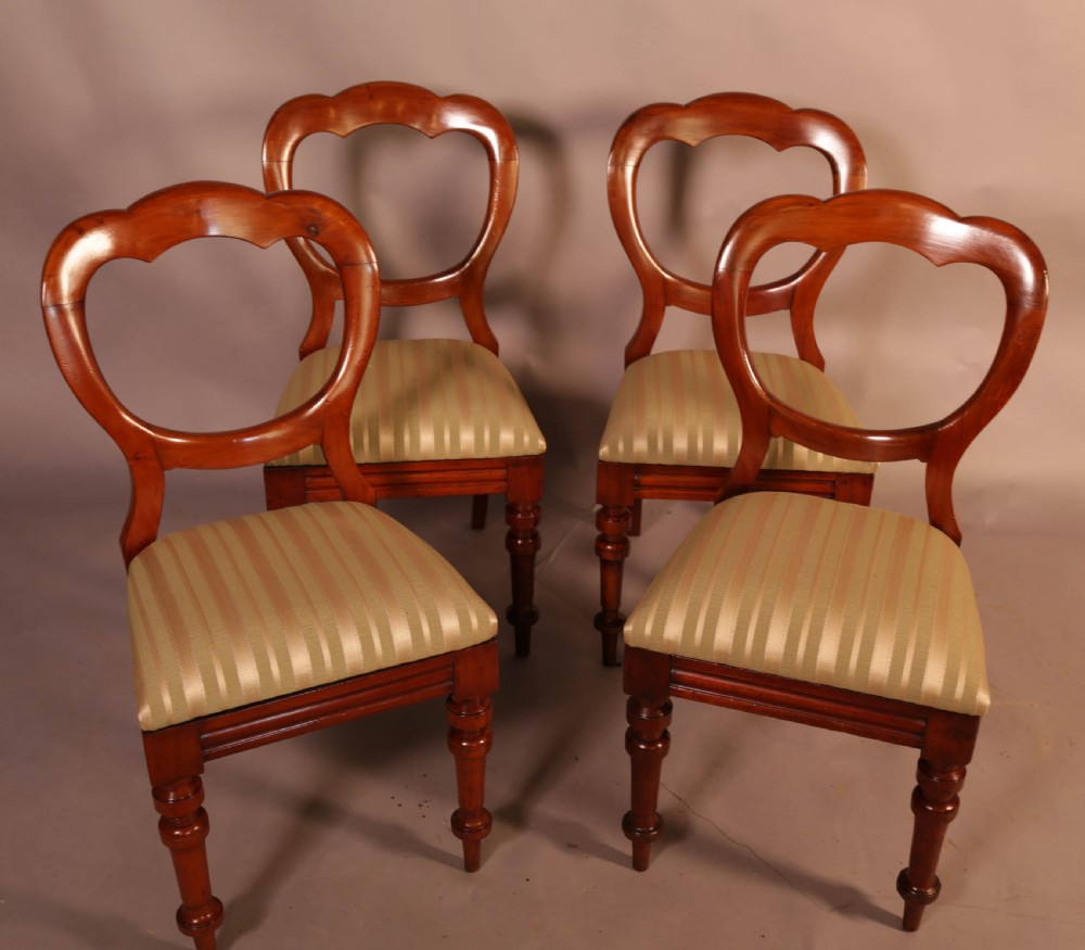 A Good Set of 12 Victorian Mahogany Balloon Back dining Chairs View IV