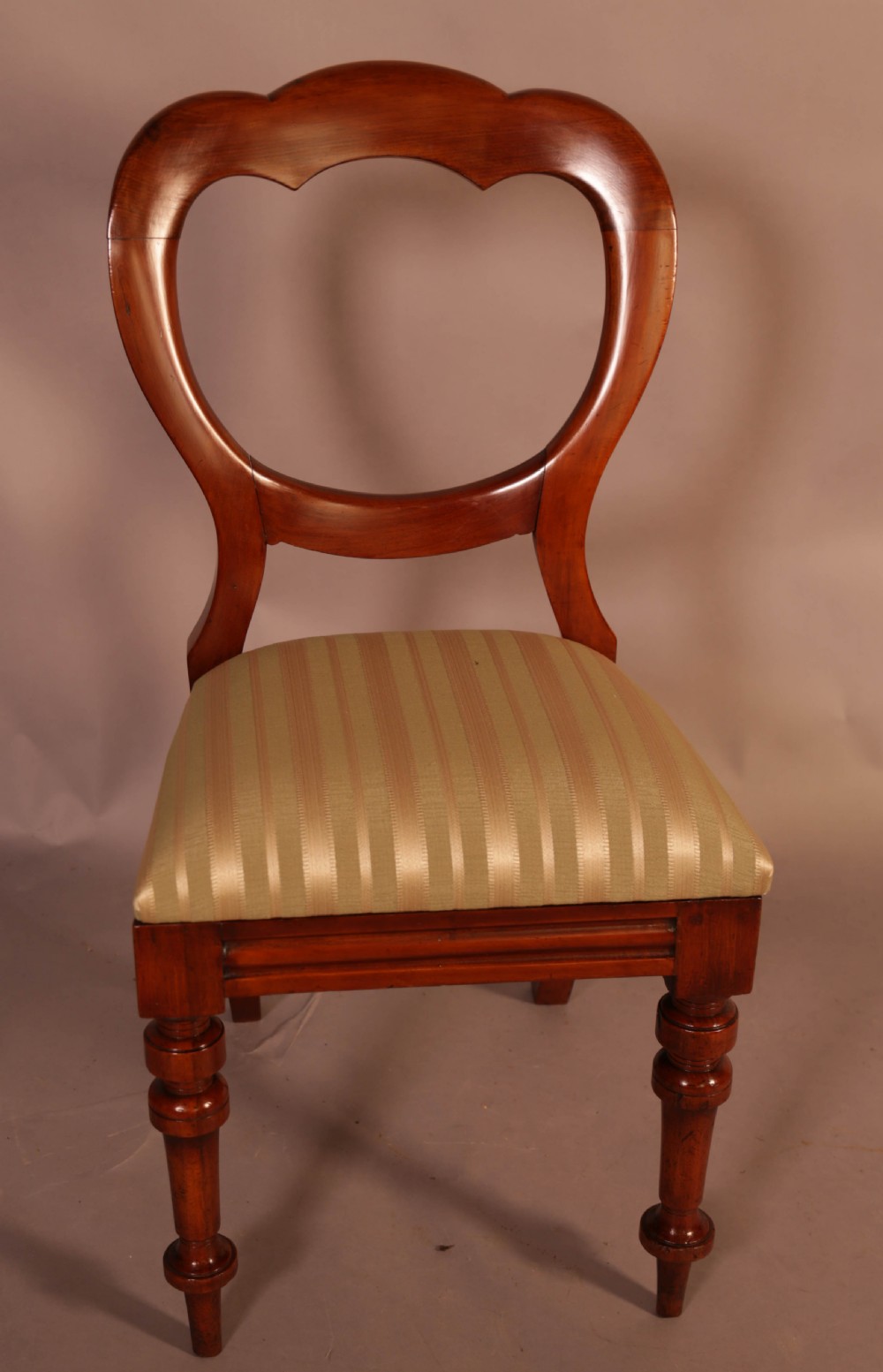A Good Set of 12 Victorian Mahogany Balloon Back dining Chairs View VI