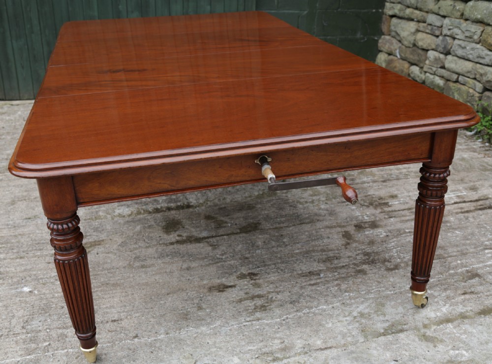 An Early Victorian Mahogany Extending Dining Table Seats 10 View III