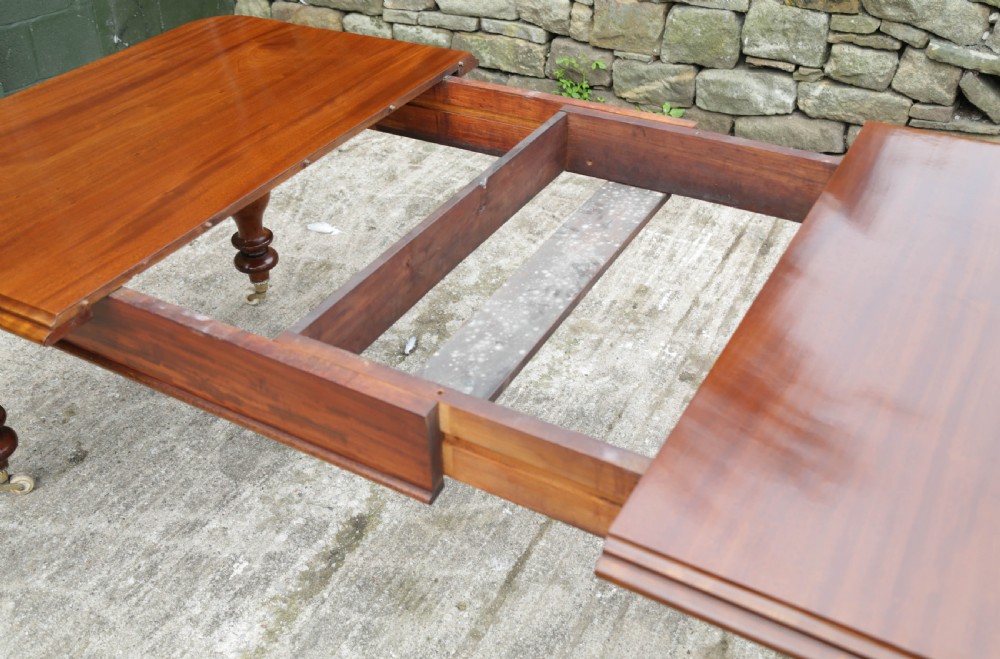 A Victorian Mahogany Extending Dining Table in Mahogany seats 8/10 View V