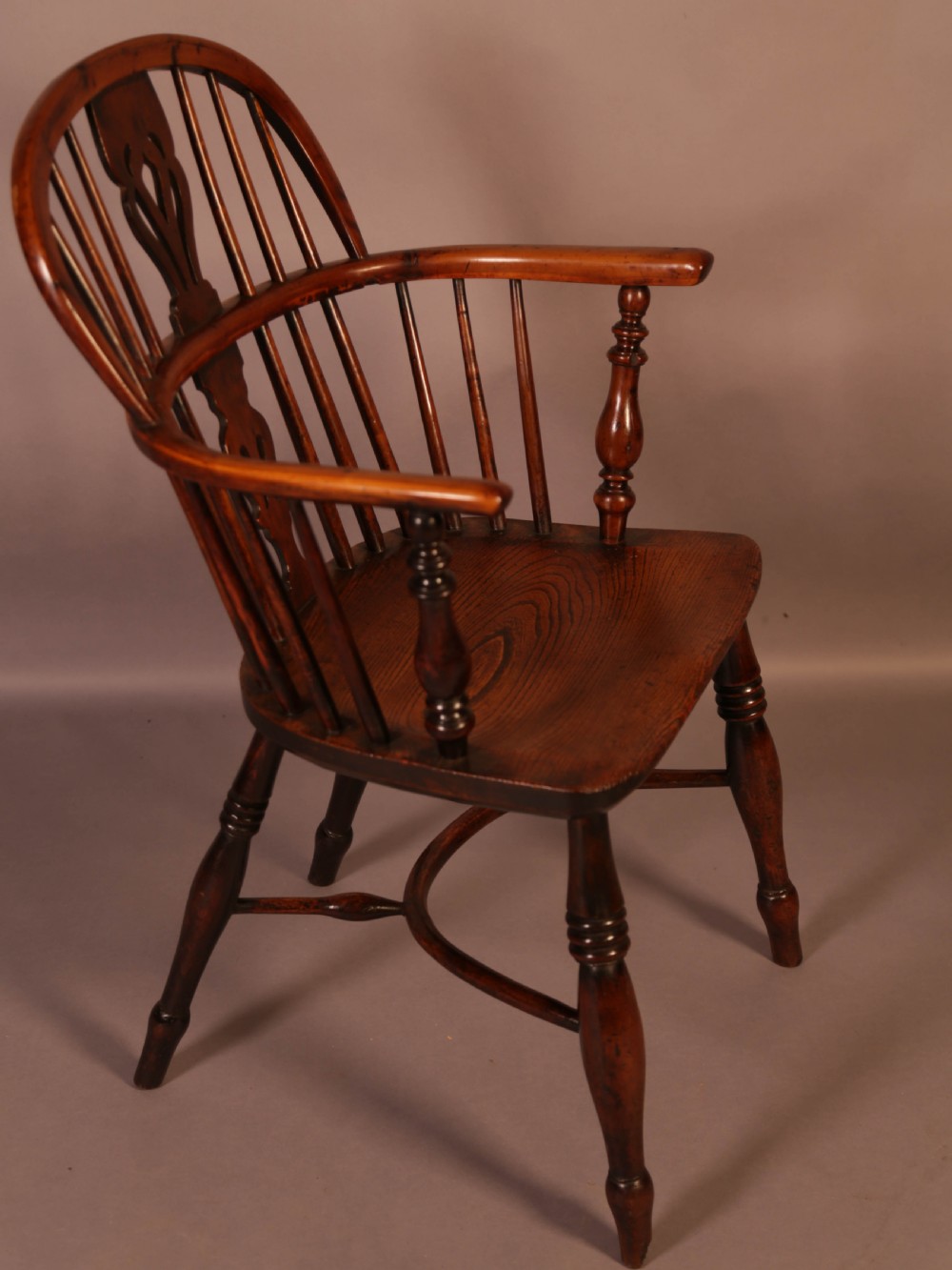 A Yew Wood Low Windsor Chair Rockley Maker c 1840