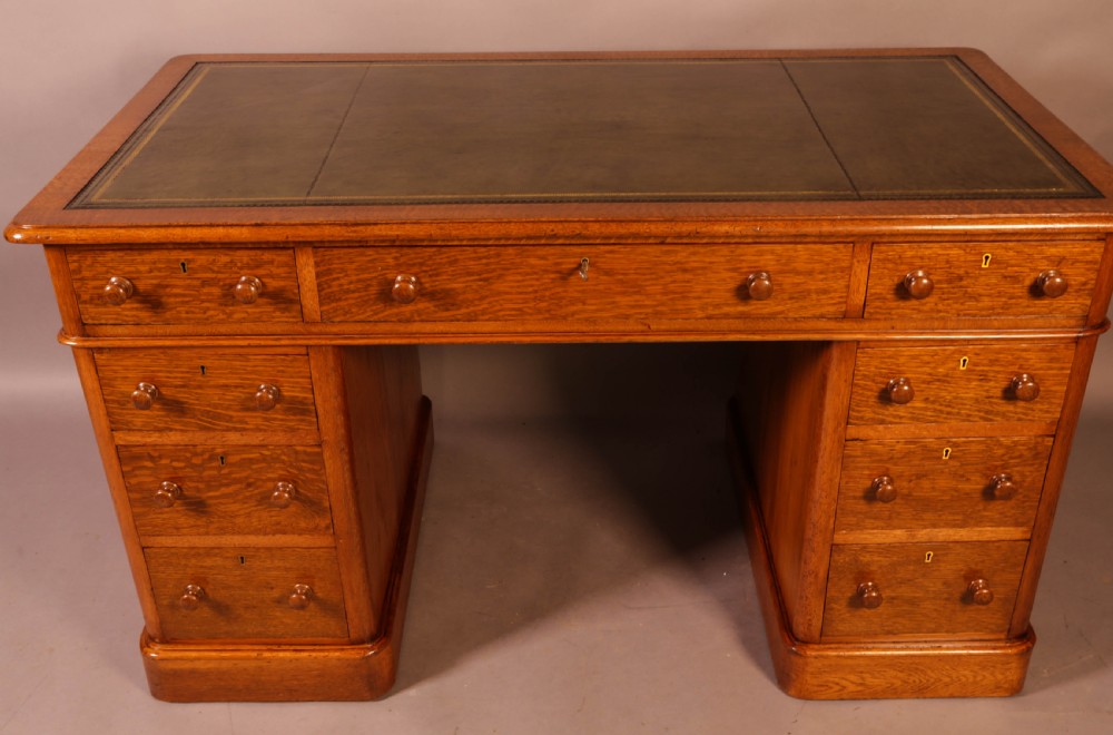 A Victorian Pedestal Desk in Golden Oak