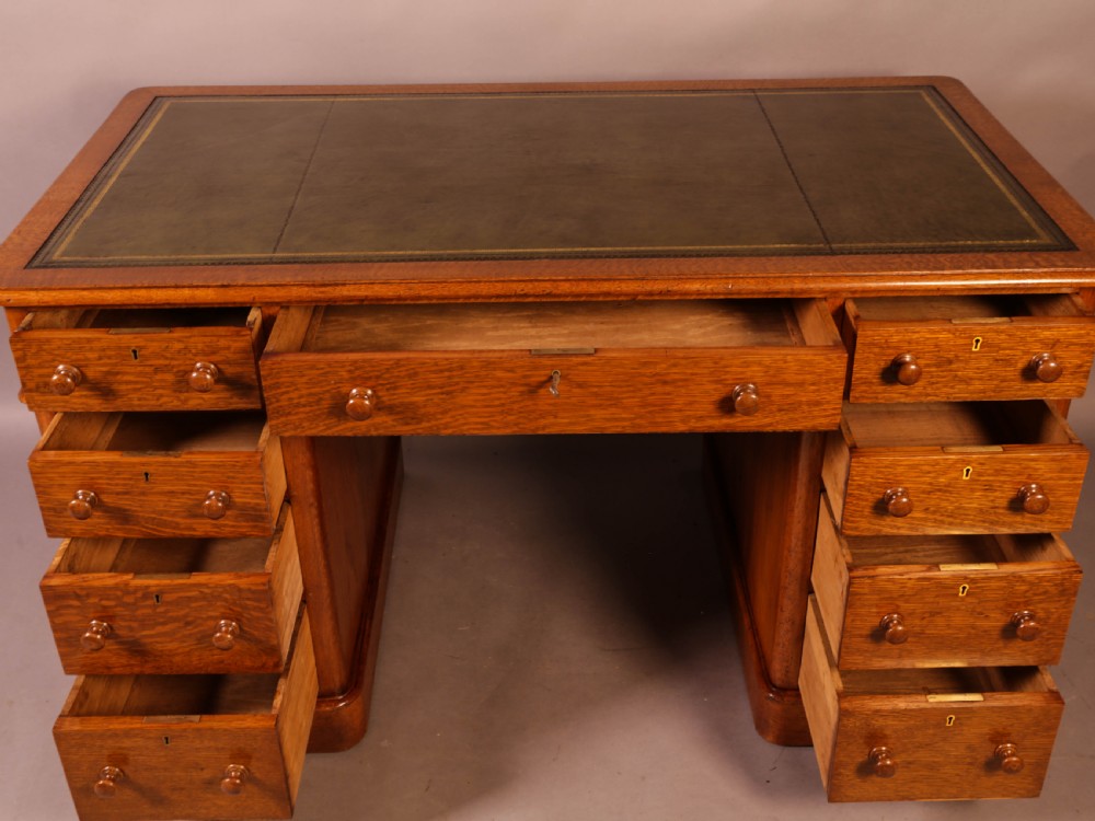 A Victorian Pedestal Desk in Golden Oak View II