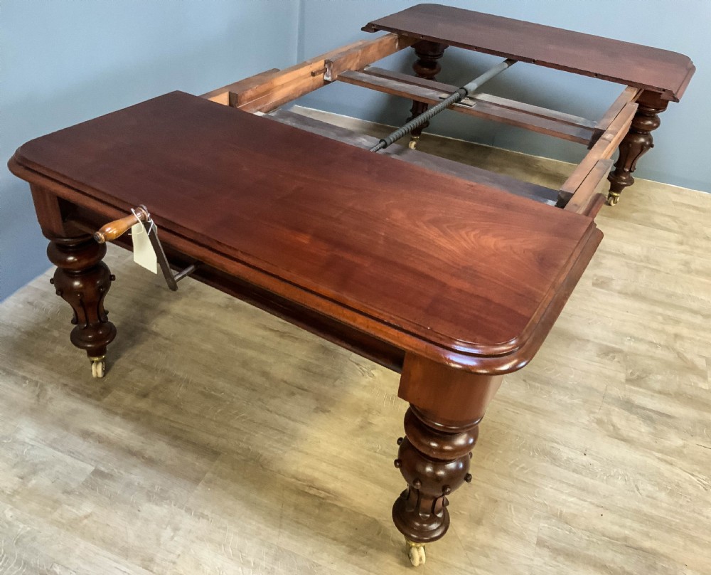A Victorian Mahogany Extending Dining table seats 10 View IX