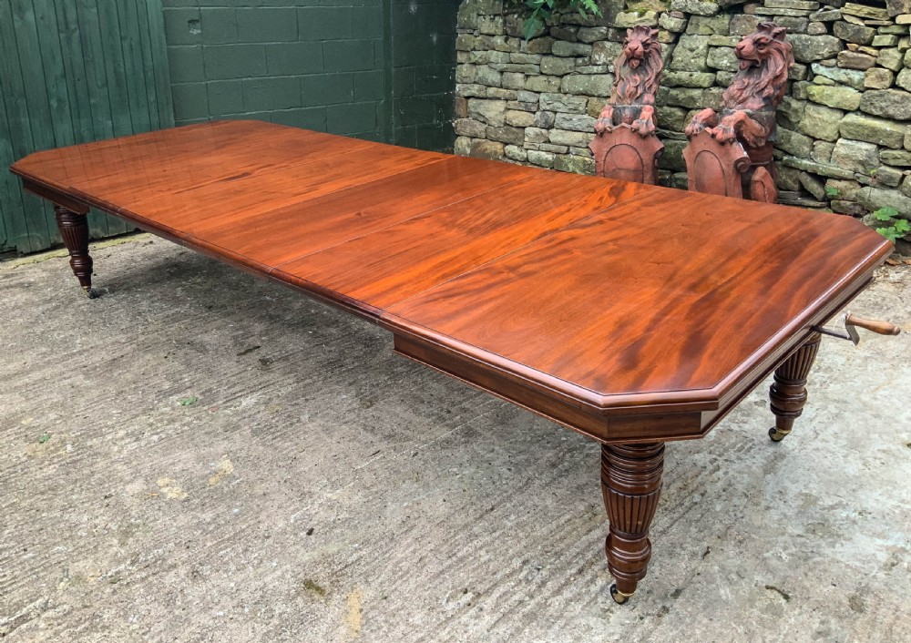 A Good Victorian Mahogany Extending Dining Table seats 14 View II