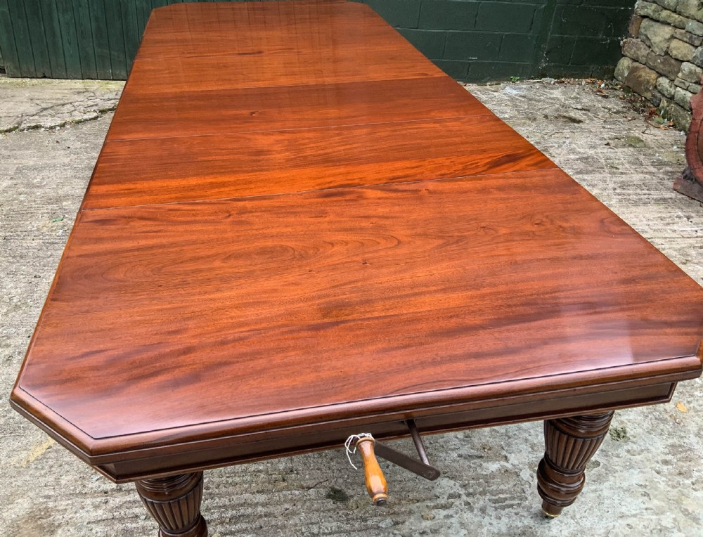 A Good Victorian Mahogany Extending Dining Table seats 14 View III