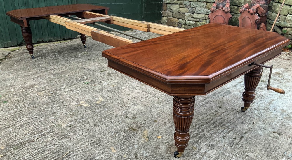 A Good Victorian Mahogany Extending Dining Table seats 14 View VII