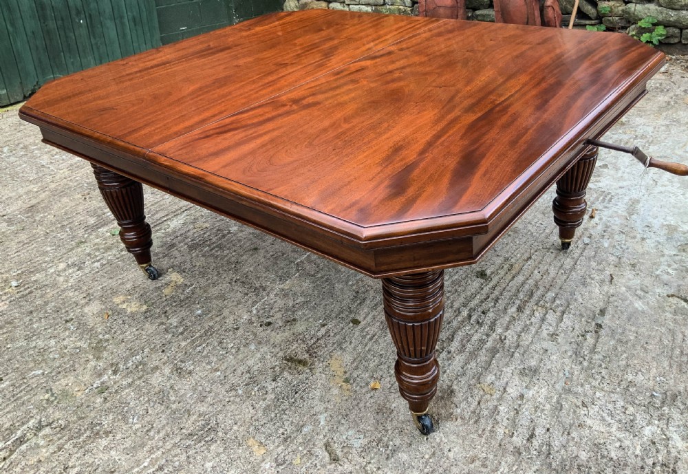 A Good Victorian Mahogany Extending Dining Table seats 14 View IX