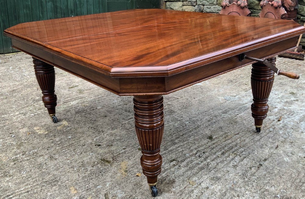 A Good Victorian Mahogany Extending Dining Table seats 14 View XI