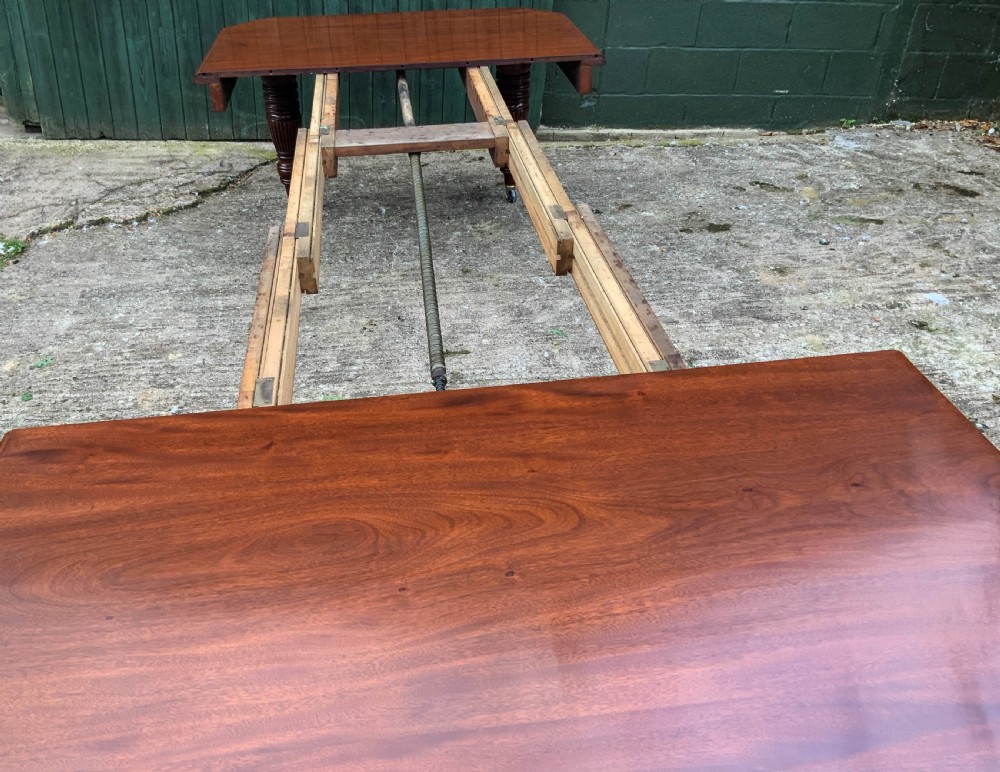 A Good Victorian Mahogany Extending Dining Table seats 14 View XII