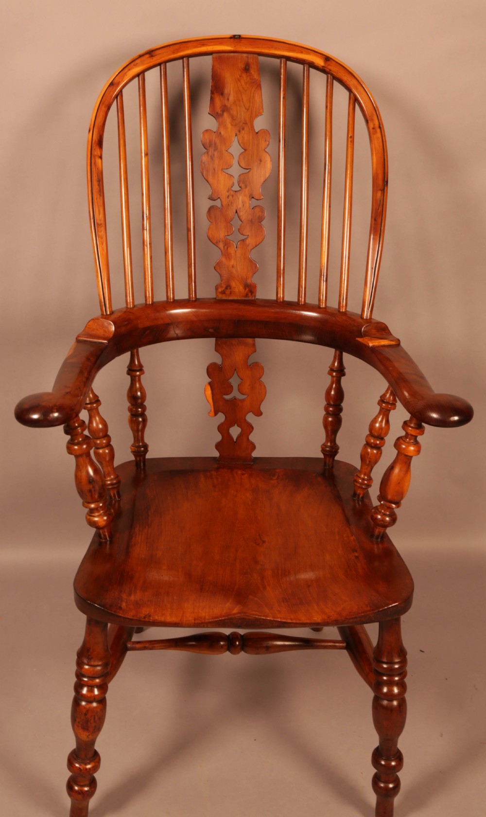 A Yew Wood Broad Arm Windsor chair Allsop Worksop