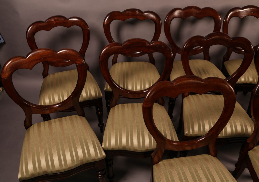 A Good Set of 12 Victorian Mahogany Balloon Back Dining Chairs View III