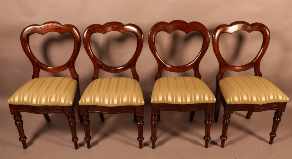 A Good Set of 12 Victorian Mahogany Balloon Back Dining Chairs View V