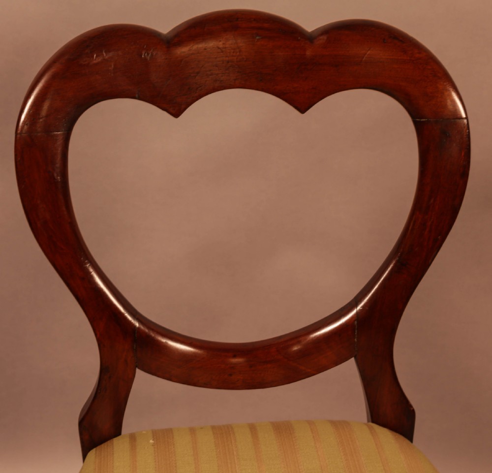A Good Set of 12 Victorian Mahogany Balloon Back Dining Chairs View X