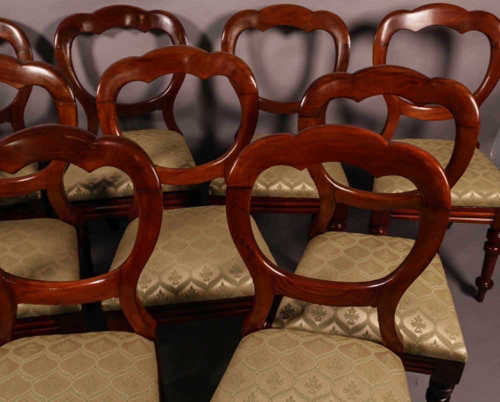 A Good set of 12 Victorian Mahogany Balloon Back dining chairs View IV