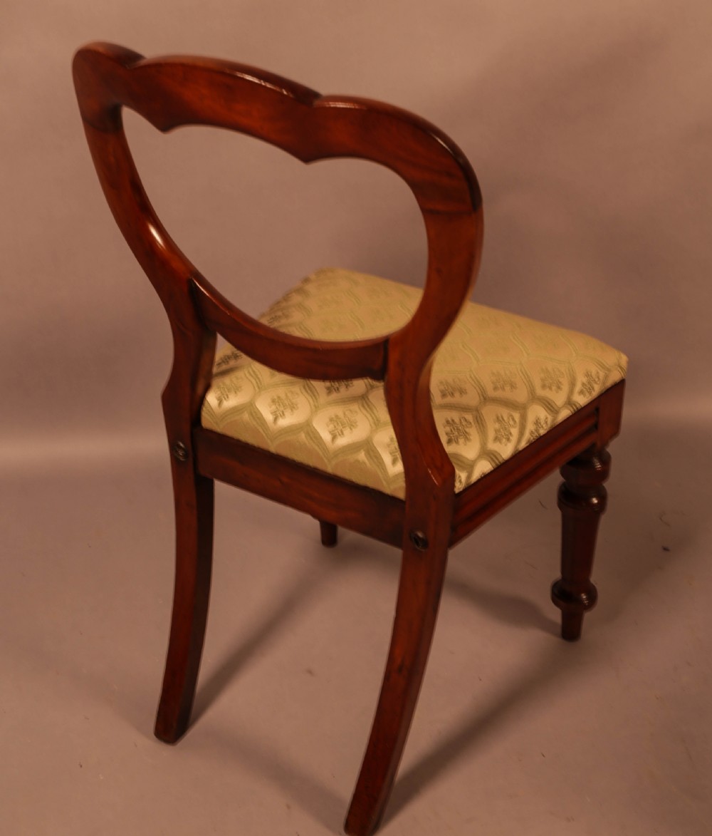 A Good set of 12 Victorian Mahogany Balloon Back dining chairs View IX