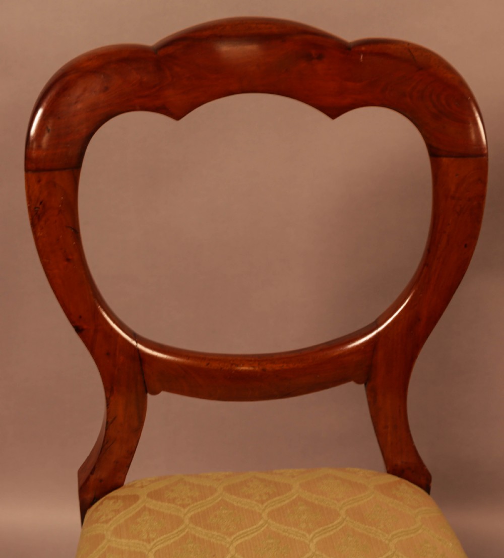 A Good set of 12 Victorian Mahogany Balloon Back dining chairs View X