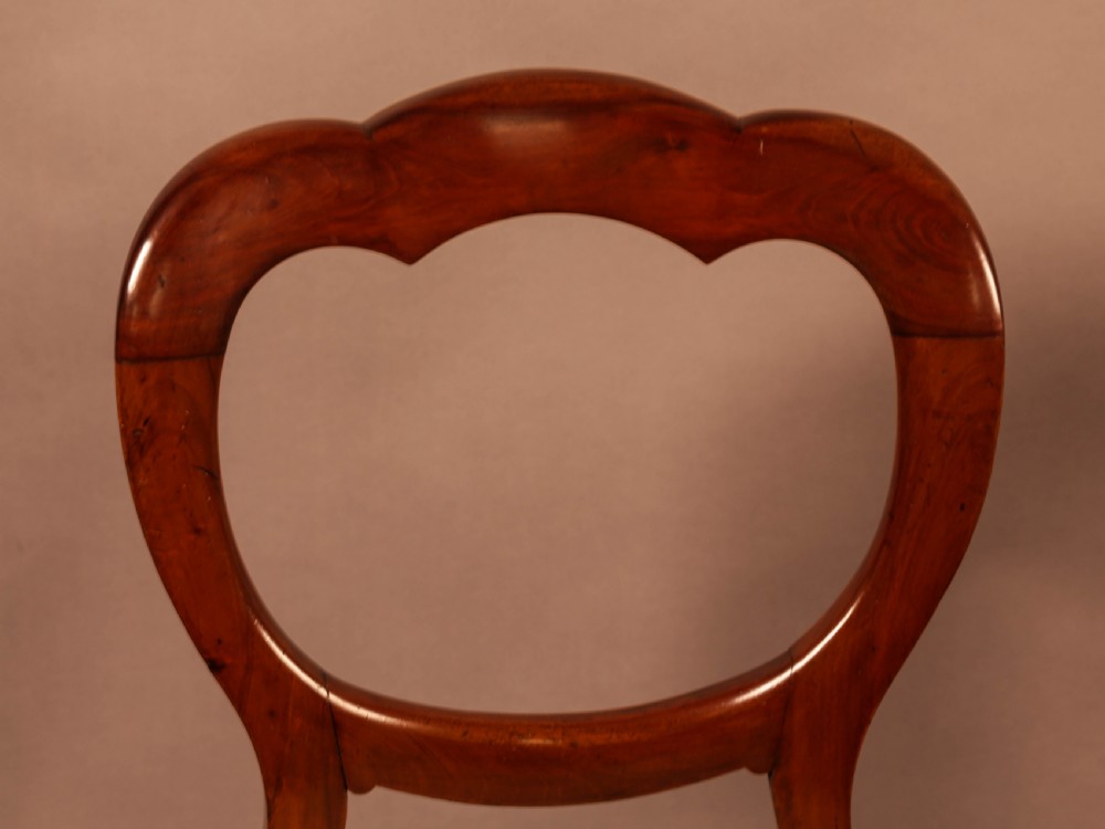 A Good set of 12 Victorian Mahogany Balloon Back dining chairs View XI