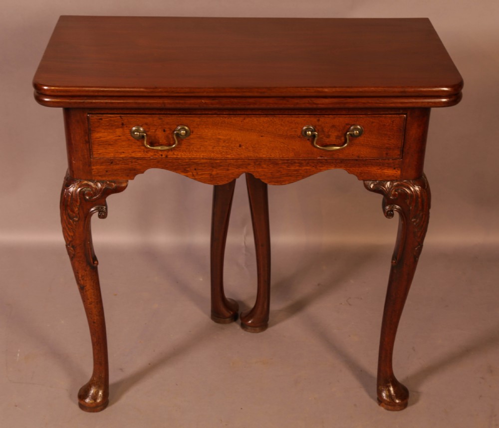 A George II Tea Table Cabriole legs carved knee