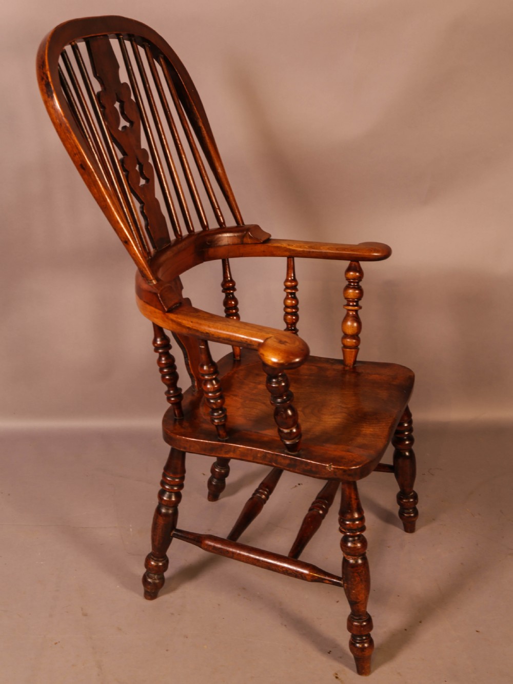 A Victorian Broad Arm Windsor chair Ash and Elm