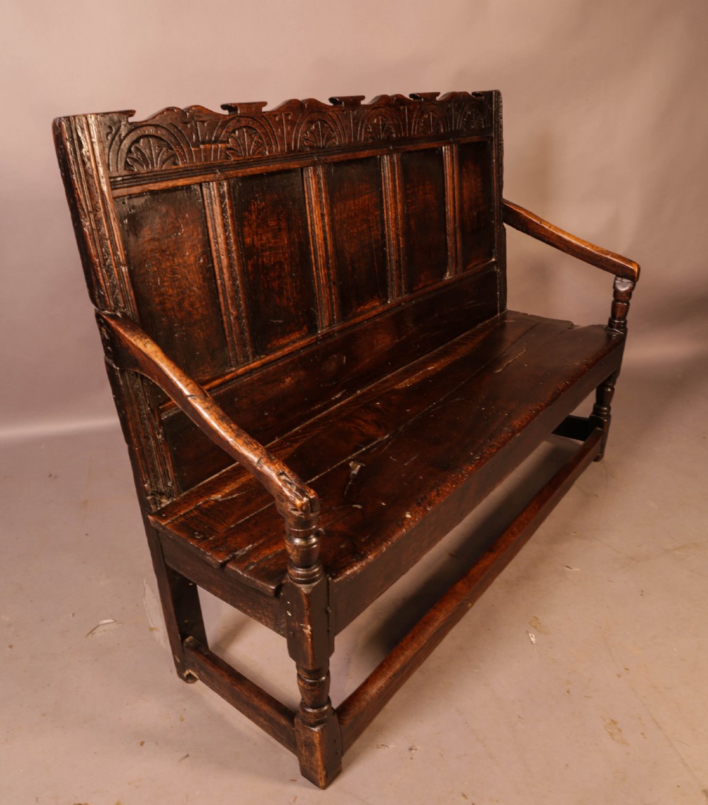 A 17th century Oak Settle View IX