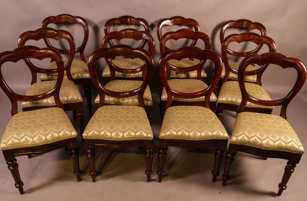 A Set of 12 Victorian Mahogany Balloon Back Dining Chairs View II