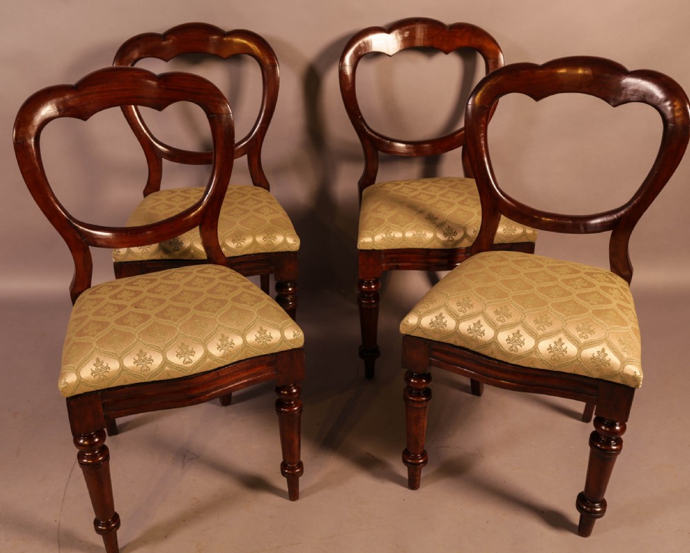 A Set of 12 Victorian Mahogany Balloon Back Dining Chairs View V
