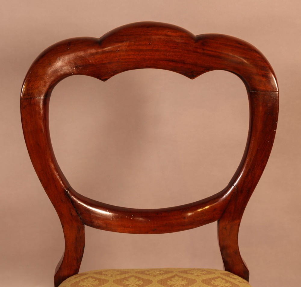 A Set of 12 Victorian Mahogany Balloon Back Dining Chairs View IX