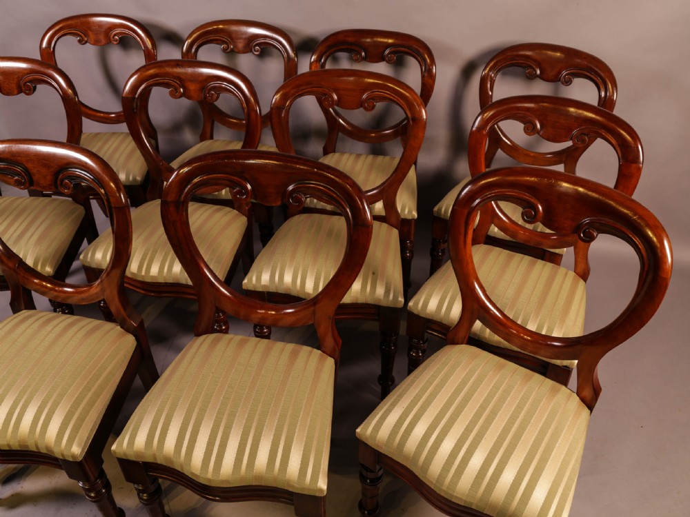 A Set of 12 Victorian Mahogany Balloon Back Dining Chairs View III
