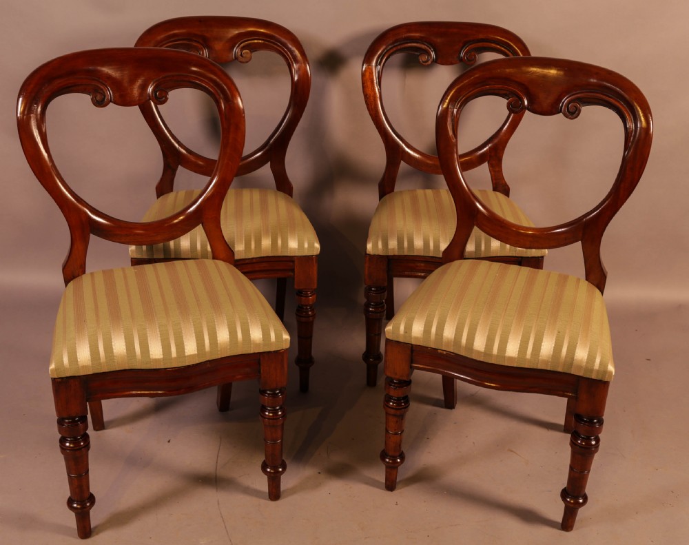 A Set of 12 Victorian Mahogany Balloon Back Dining Chairs View V