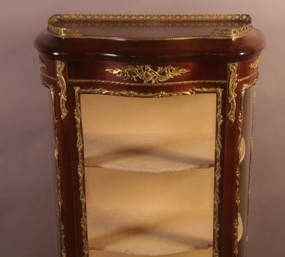 A Good Quality French Serpentine Front Display Cabinet View X