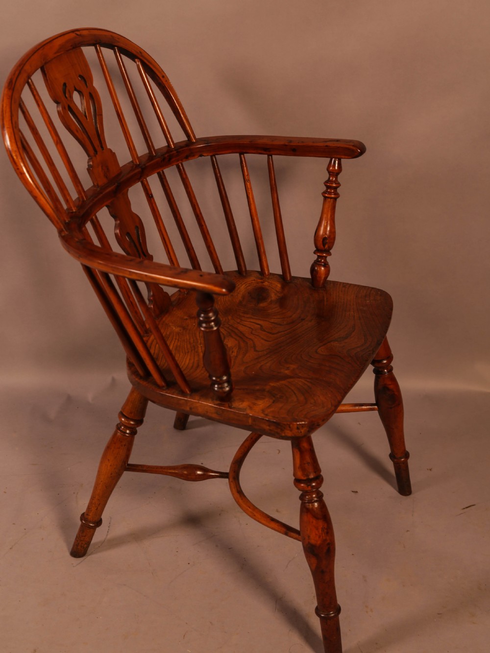 A Yew Wood low Windsor Chair Rockley Maker