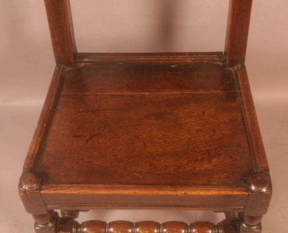 A 17th century Oak Back Stool View VII