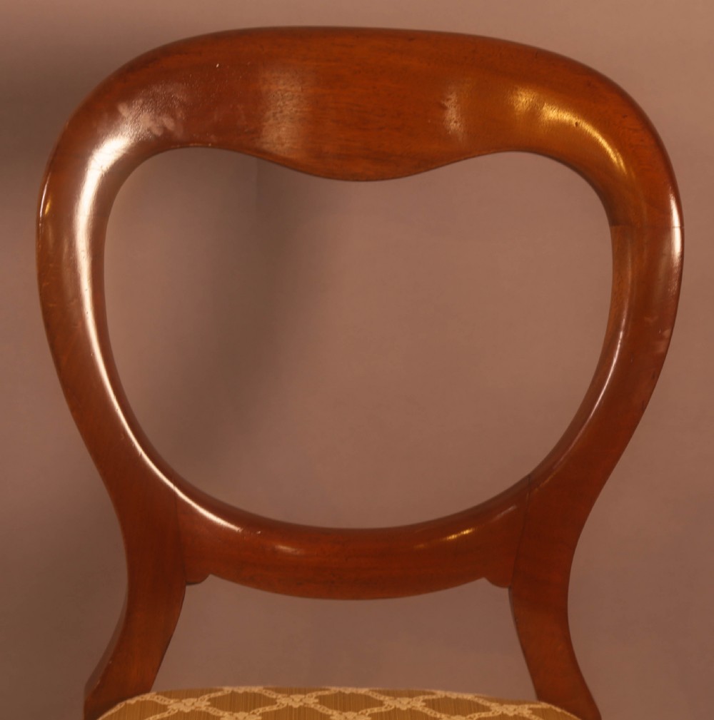 A Set of 10 Victorian Mahogany Balloon Back Dining chairs View IX