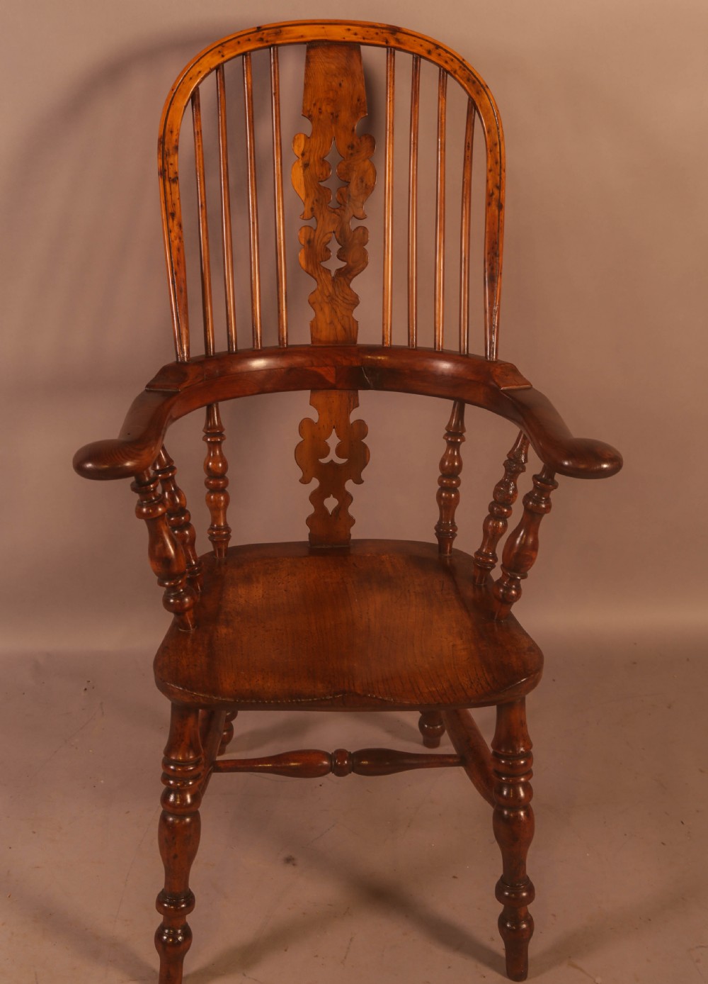 A Very Good 19th century Broad Arm Yew Windsor Chair