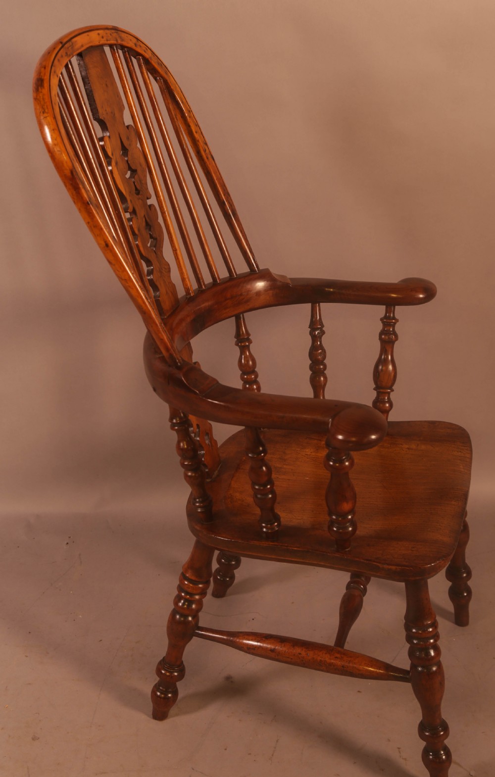 A Very Good 19th century Broad Arm Yew Windsor Chair View II