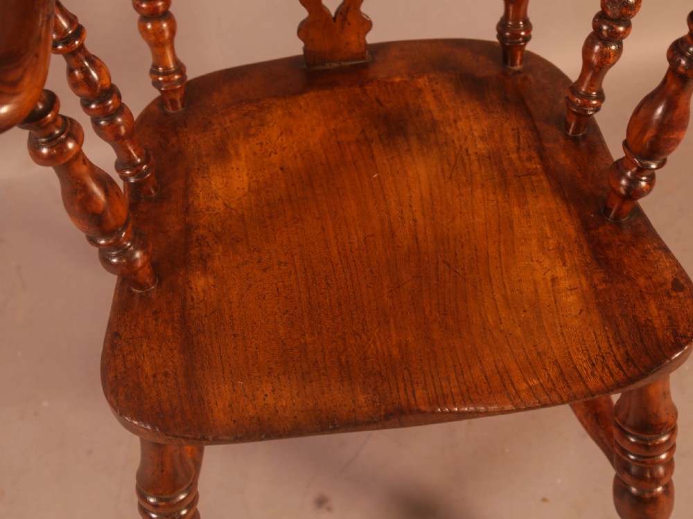 A Very Good 19th century Broad Arm Yew Windsor Chair View VIII