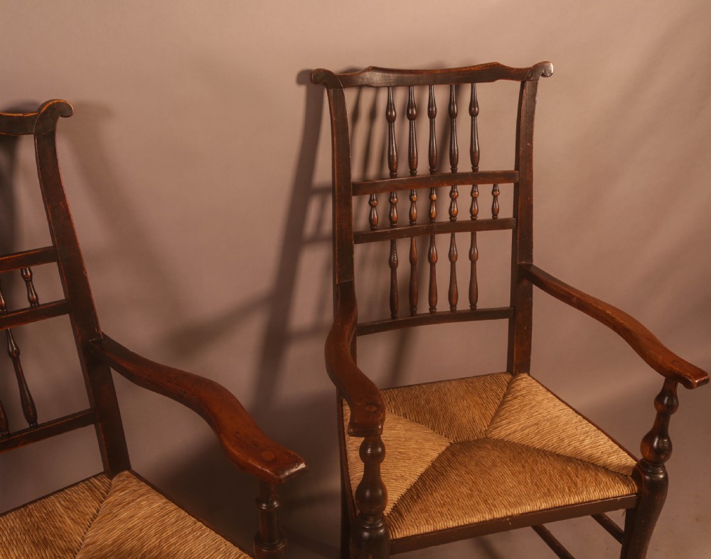 A Pair of 19th century Spindle Back Armchairs with rush seats View III
