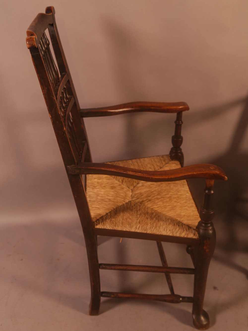 A Pair of 19th century Spindle Back Armchairs with rush seats View V