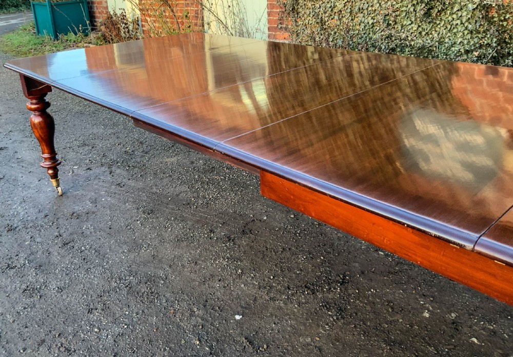 A Victorian Mahogany Extending Dining Table with 3 Leaves seats 12 View III