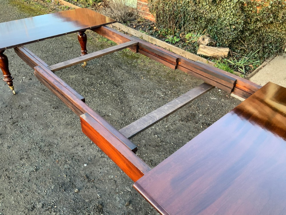 A Victorian Mahogany Extending Dining Table with 3 Leaves seats 12 View VIII