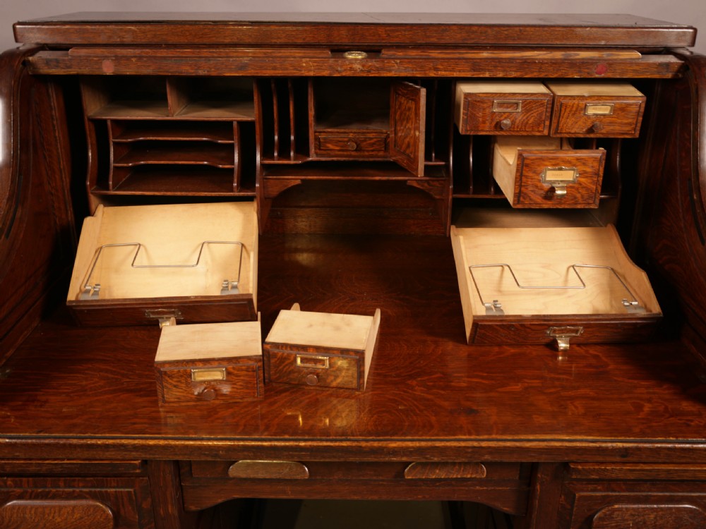 A good Oak Roll Top Desk by Maples London View VIII
